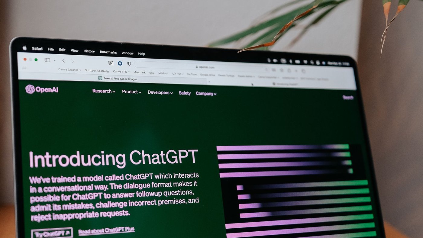 A laptop displaying an earlier ChatGPT webpage